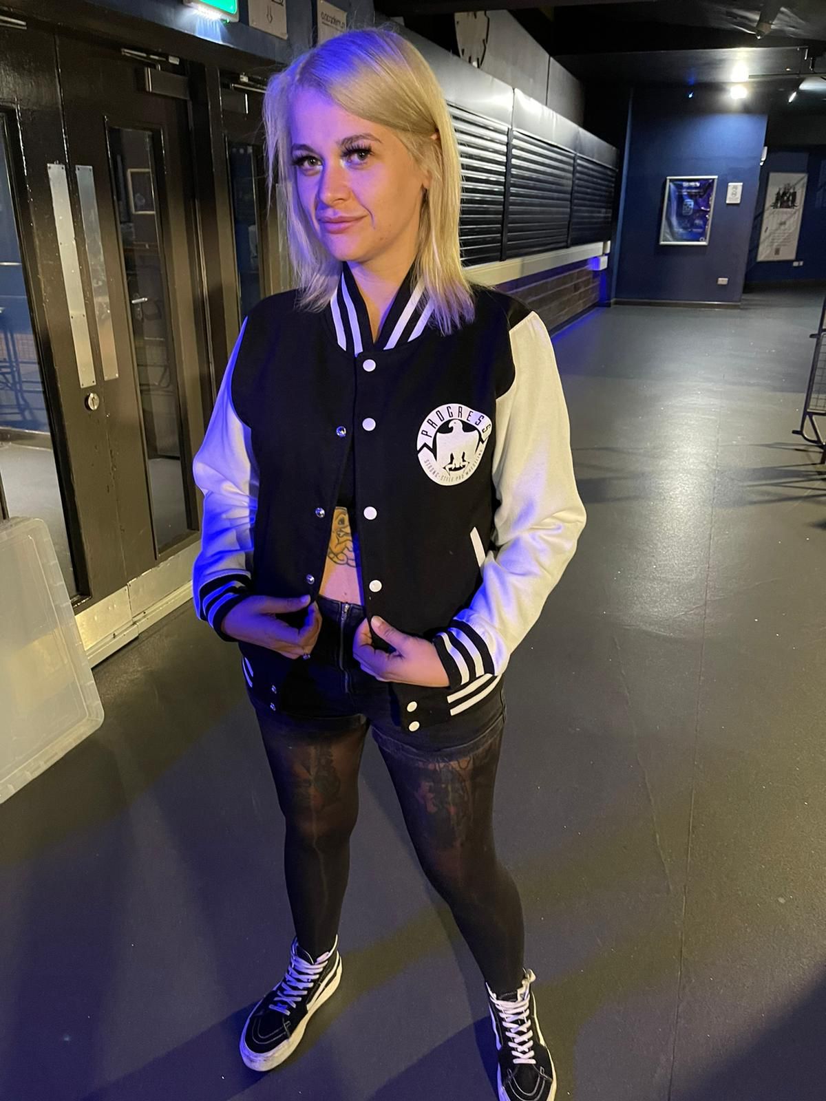 PROGRESS WRESTLING JACKET BLACK AND WHITE VARSITY PROGRESS WRESTLING LOGO
